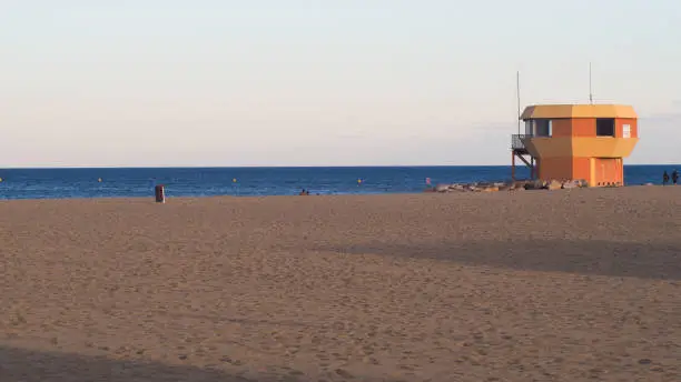 Walk to Port-Leucate beach, during dusk.  Tourists continue to swim at this time