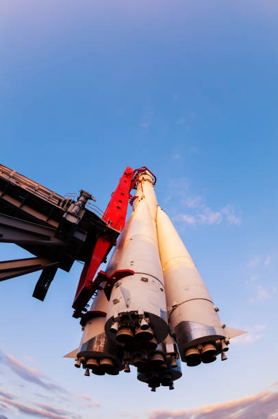 istock Big space rocket hang on the launchpad stand over sky 1394160208