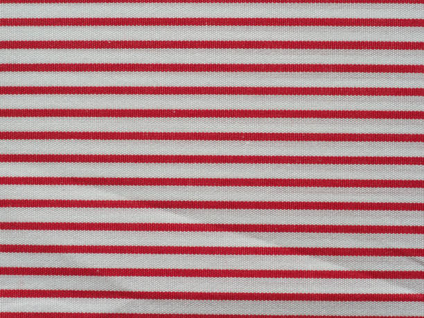 istock striped red and white cotton fabric texture background 1394161713