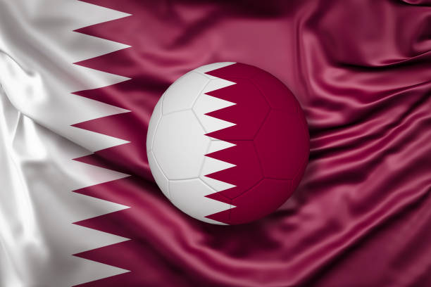 istock Soccer Ball with Qatar flag 1394165470