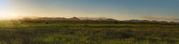 istock Colored gradient hills at sunlight and fug, sunset 1394171074