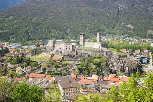 Bellinzona, Switzerland - April 22, 2021: Bellinzona is a municipality, historic Swiss town. It's the capital of the canton of Ticino in Switzerland. The town is famous for its three castles (Castelgrande on the picture, Montebello, Sasso Corbaro) that have been UNESCO World Heritage Sites since 2000.