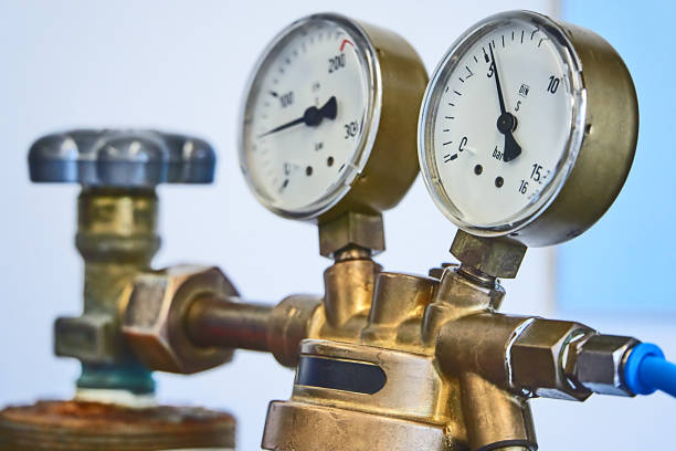 Pressure Reducer Brass pressure reducer gauge pressure gauge pipe valve stock pictures, royalty-free photos & images