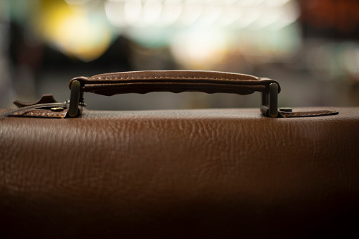 Leather bag. Men's briefcase made of brown leather. Accessory for guy. Business suitcase.