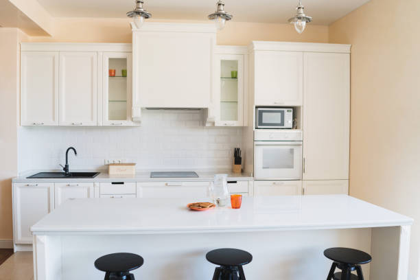 istock Decanter with water and plate with waffles in the kitchen. 1394192365