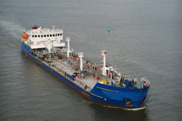 istock A barge is floating on the river. River industrial transport. 1394194171