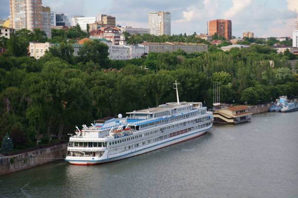 istock River cruise boat at the city pier. 1394194233