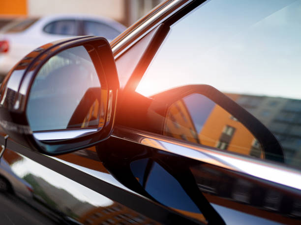 istock Anti-glare rearview mirror on a black car. 1394203140
