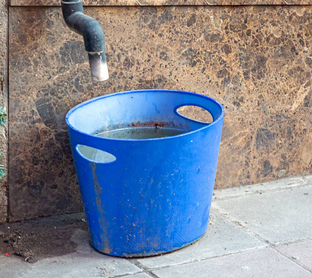 istock Air conditioner pipe on city street 1394204535