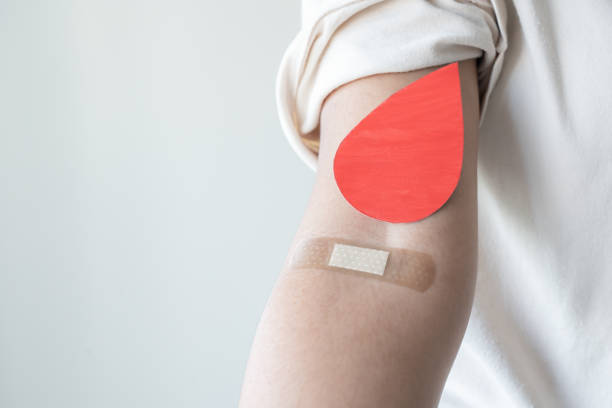 istock Blood donation concept. Give blood save up to three lives. 1394204621