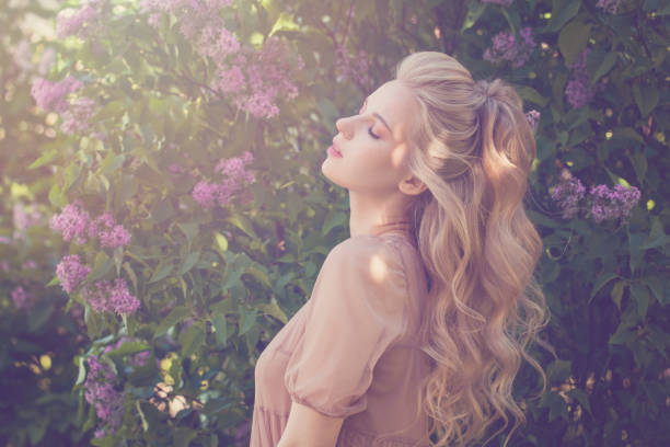 istock Attractive woman enjoying spring april sun 1394207097