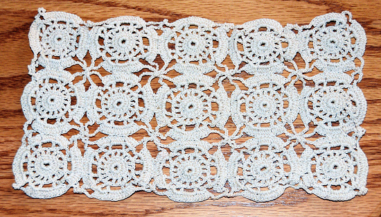 Crocheted tablecloth or other decoration.
