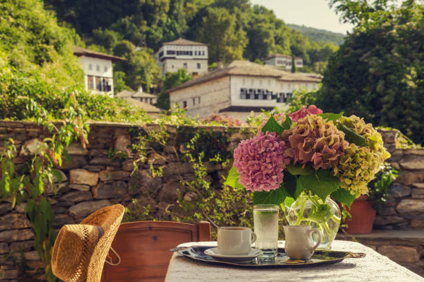 istock Still life with hydrangea and a cup of coffee on the table close-up 1394209714
