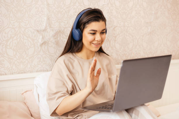 istock A girl studies or works remotely at home and home office 1394210072