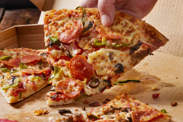 istock Deluxe New York Style Pizza 1394213414