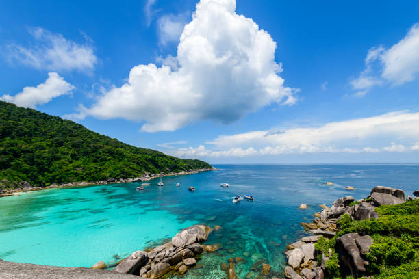 istock Panoramic view of Koh.8 Similan Island with white cloud and blue sky 1394213667