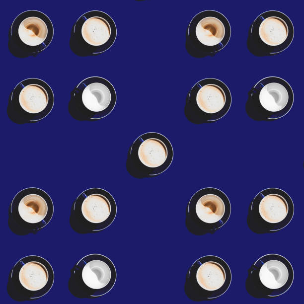 istock A square pattern of blue cups on a blue background. Coffee break. 1394216044