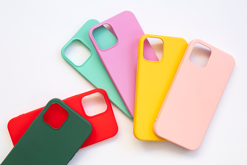 Cases set for smartphone on white background. Silicone protection for mobile phone. Colorful silicone phone cases.