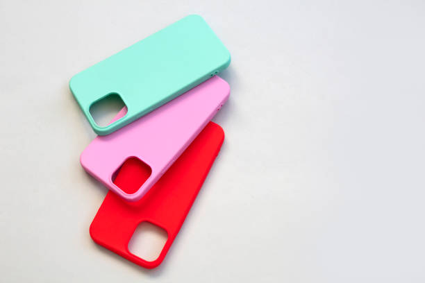 istock Cases set for smartphone on grey background. Silicone protection for mobile phone. Colorful silicone phone cases. 1394217486