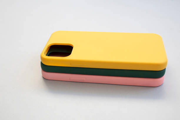 Cases set for smartphone on grey background. Silicone protection for mobile phone. Colorful silicone phone cases.