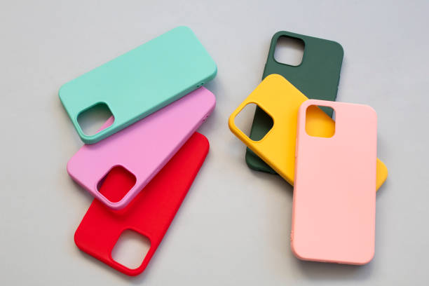 istock Cases set for smartphone on grey background. Silicone protection for mobile phone. Colorful silicone phone cases. 1394217623