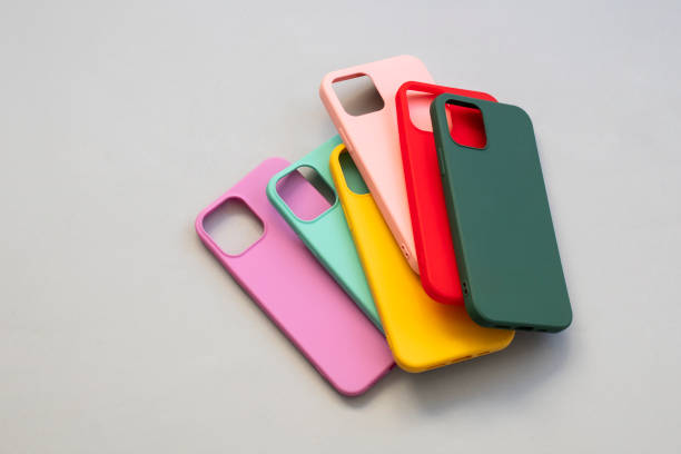 istock Cases set for smartphone on grey background. Silicone protection for mobile phone. Colorful silicone phone cases. 1394217628