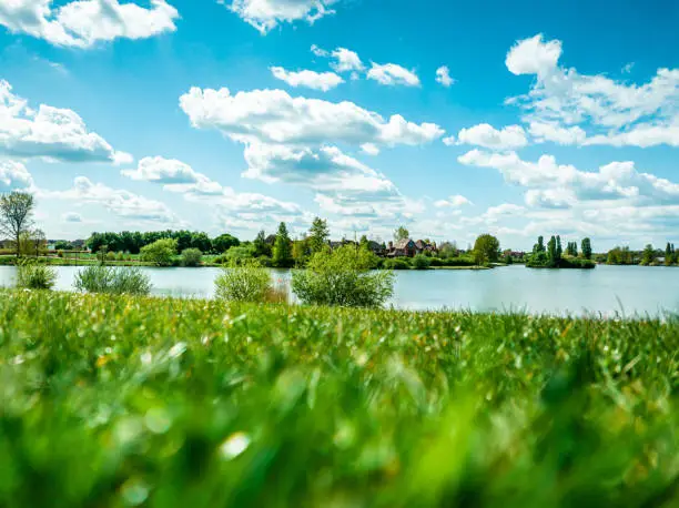 Photo of Furzton Lake lake under blue cloudy sky in summer