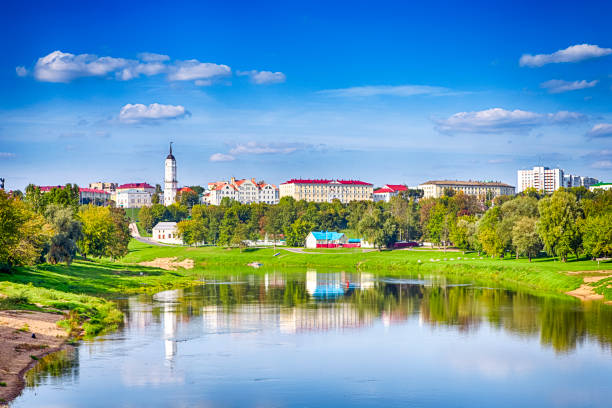 Belarus Travel Destinations. Cityscape of Mogilev City At Daytime Across the Dubrovenka and Dnieper River With City Hall in Background Belarus Travel Destinations. Cityscape of Mogilev City At Daytime Across the Dubrovenka and Dnieper River With City Hall in Background. Horizontal Image belarus stock pictures, royalty-free photos & images