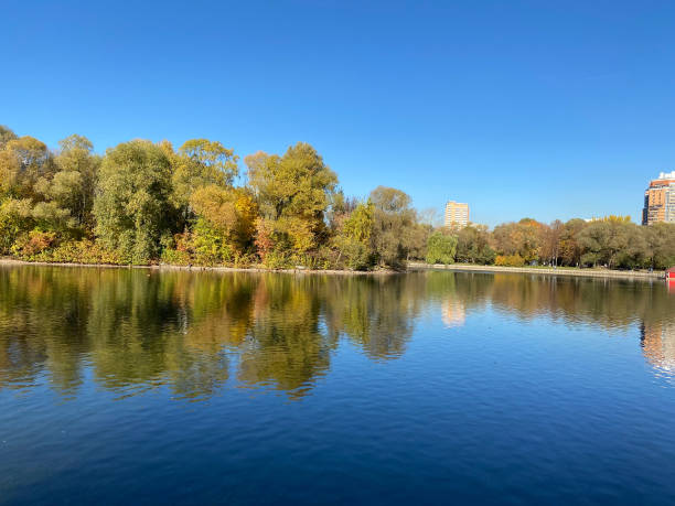 istock park in autumn at dry sunny fall day 1394223523