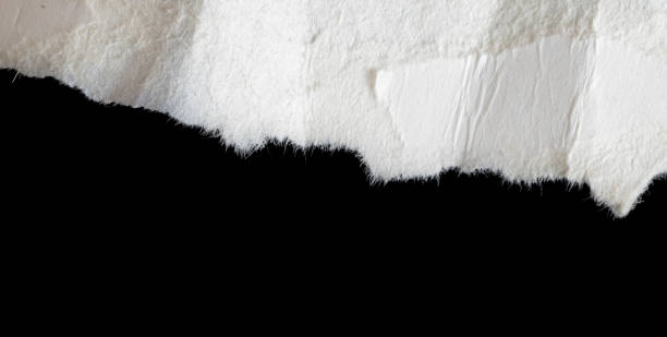 istock a white piece of paper on a black isolated background 1394225407