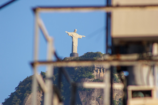 Christ the Redeemer in Rio de Janeiro, Brazil - April 18, 2022: Christ the Redeemer seen from the Botafogo neighborhood in Rio de Janeiro.