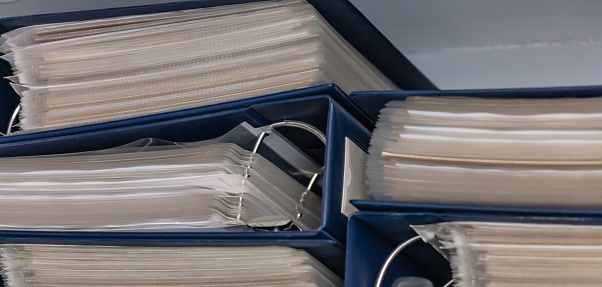 Close-up view of multiple ring binders. Taxation, documentation concept. Personal organization