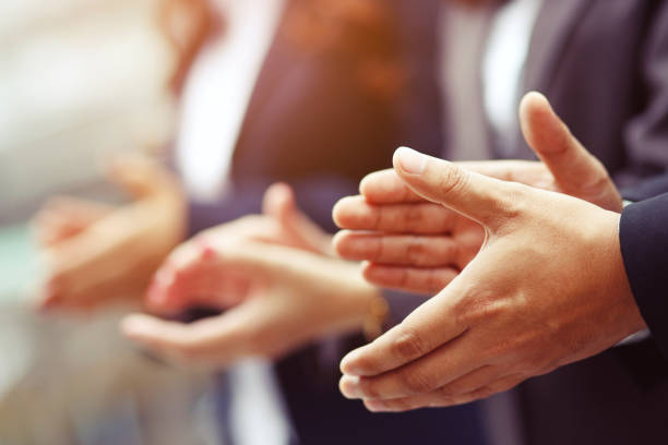 istock business people applaud congratulate with sales that exceeded the target 1394231584