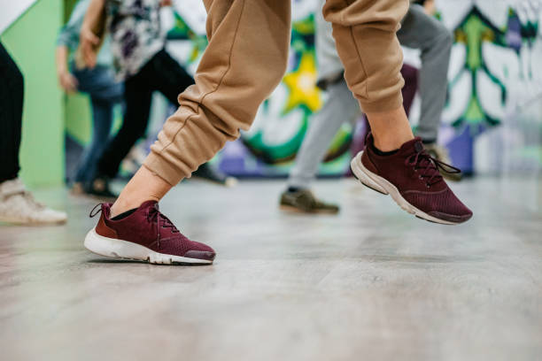 istock Young Women's Legs In A Dance Studio 1394233069