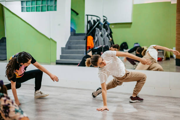 istock Young Women Dancing Hip-hop In A Dance Studio 1394233127