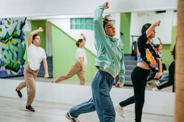 istock Young Women Dancing Hip-hop In A Dance Studio 1394233138