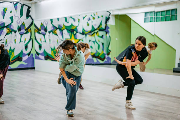 istock Young Women Dancing Hip-hop In A Dance Studio 1394233153