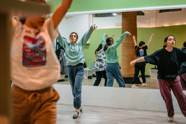 istock Young Women Dancing Hip-hop In A Dance Studio 1394233192