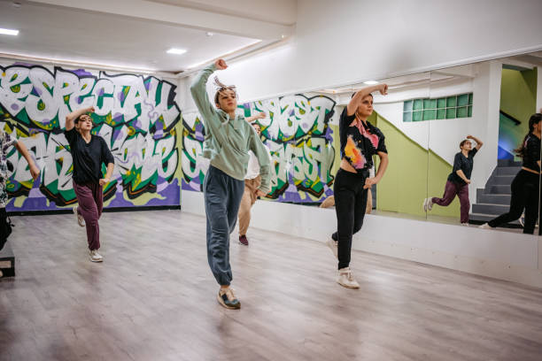 istock Young Women Dancing Hip-hop In A Dance Studio 1394233220