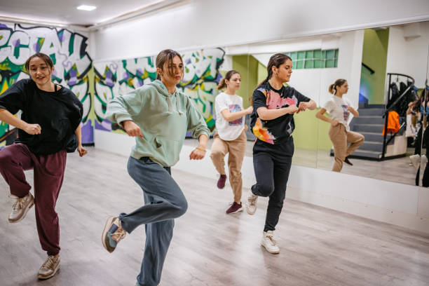 istock Young Women Dancing Hip-hop In A Dance Studio 1394233274