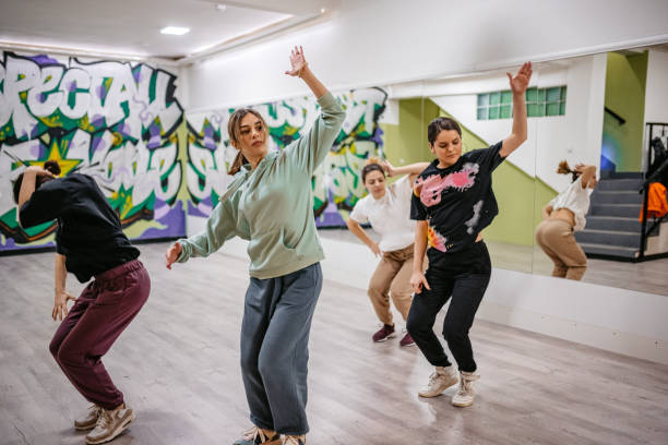 istock Young Women Dancing Hip-hop In A Dance Studio 1394233305
