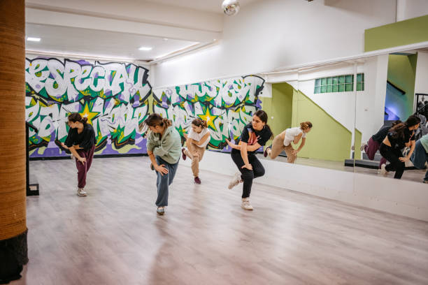 istock Young Women Dancing Hip-hop In A Dance Studio 1394233338