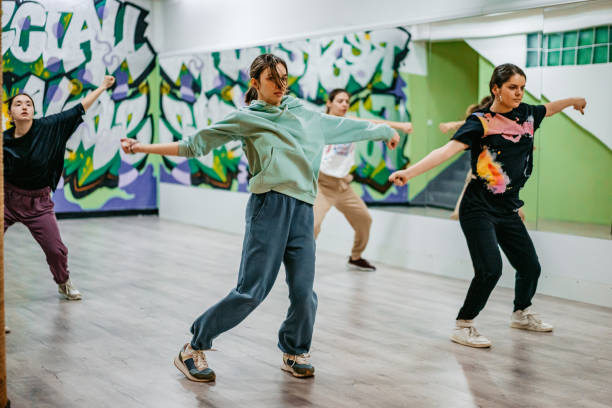 istock Young Women Dancing Hip-hop In A Dance Studio 1394233358