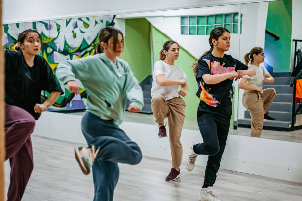 istock Young Women Dancing Hip-hop In A Dance Studio 1394233382
