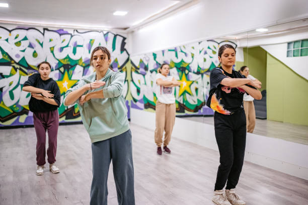 istock Young Women Dancing Hip-hop In A Dance Studio 1394233389