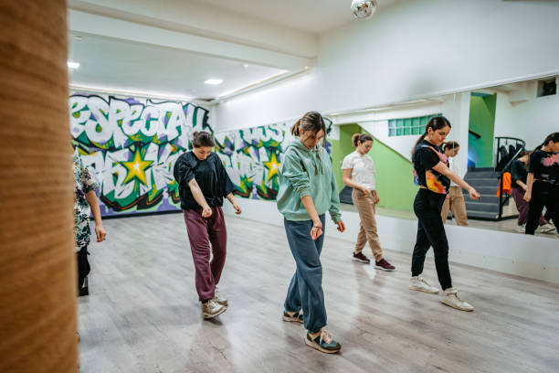 istock Young Women Dancing Hip-hop In A Dance Studio 1394233498