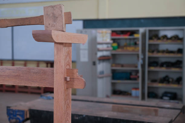 istock Senior male woodworker making console table  in workshop. Joinery work on the production  of wooden furniture. Small Business Concept 1394240269