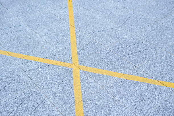 istock Square floor paved with floor tiles 1394240671