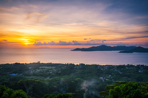 La Digue is the third most populated island of the Seychelles, and fifth largest by land area, lying east of Praslin and west of Felicite Island. In terms of size it is the fourth largest granitic island of Seychelles after Mahé, Praslin and Silhouette Island. It has a population of 2,800 people, who mostly live in the west coast villages of La Passe (linked by ferry to Praslin and Mahé) and La Réunion.