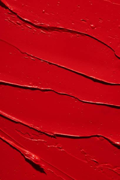 fond de texture de rouge à lèvres rouge - rouge à lèvres photos et images de collection